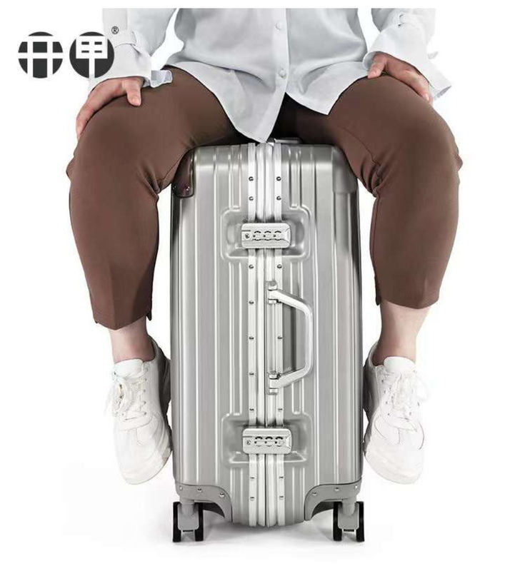 Neues neuestes Reisetasche ABS+PC Universalrad Reißverschluss Trolley Box Ziehleder Box Code Box Gepäck Großhandel